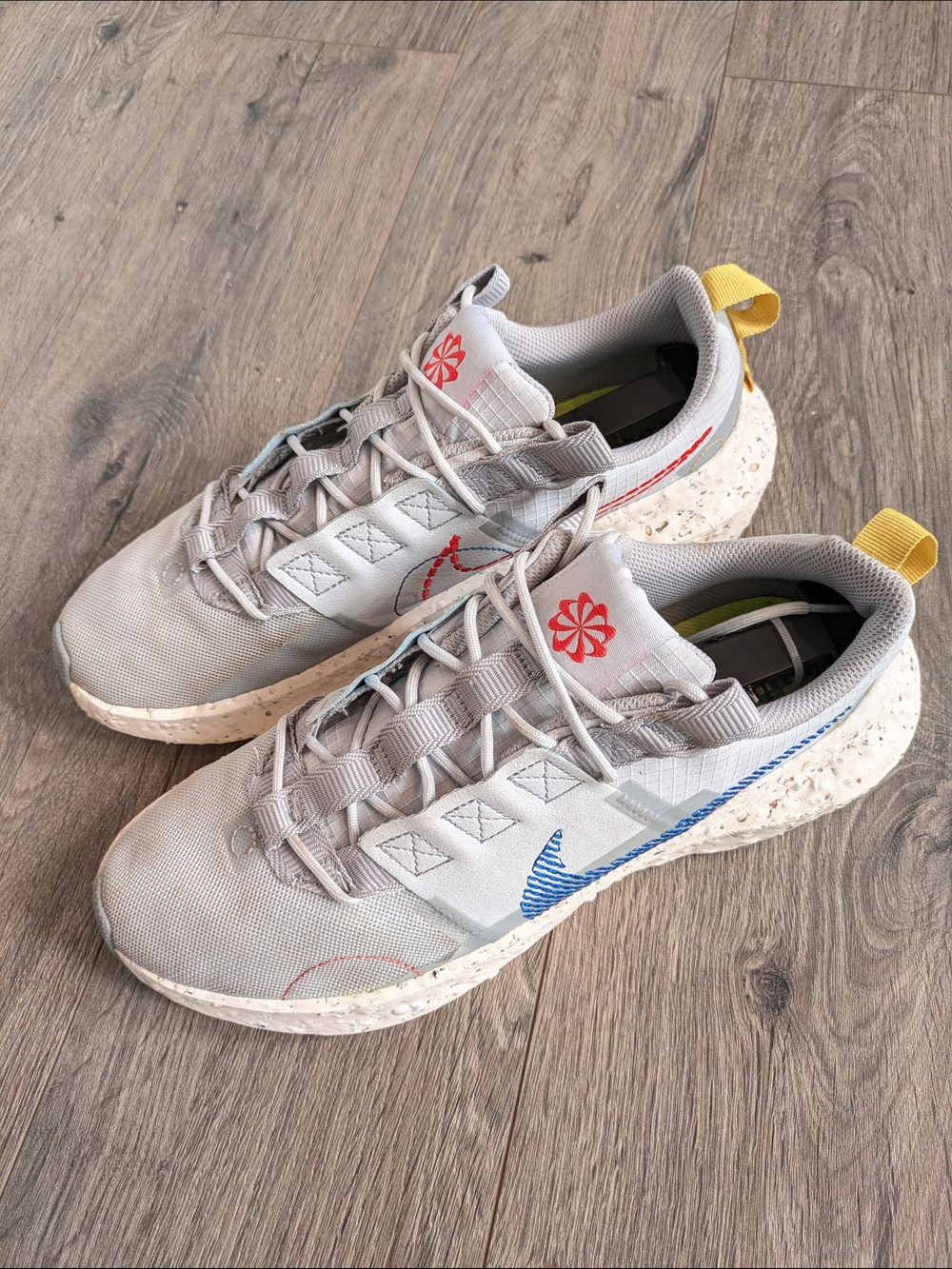 Nike Crater Impact SE sneakers in the Grey Game Royal colorway